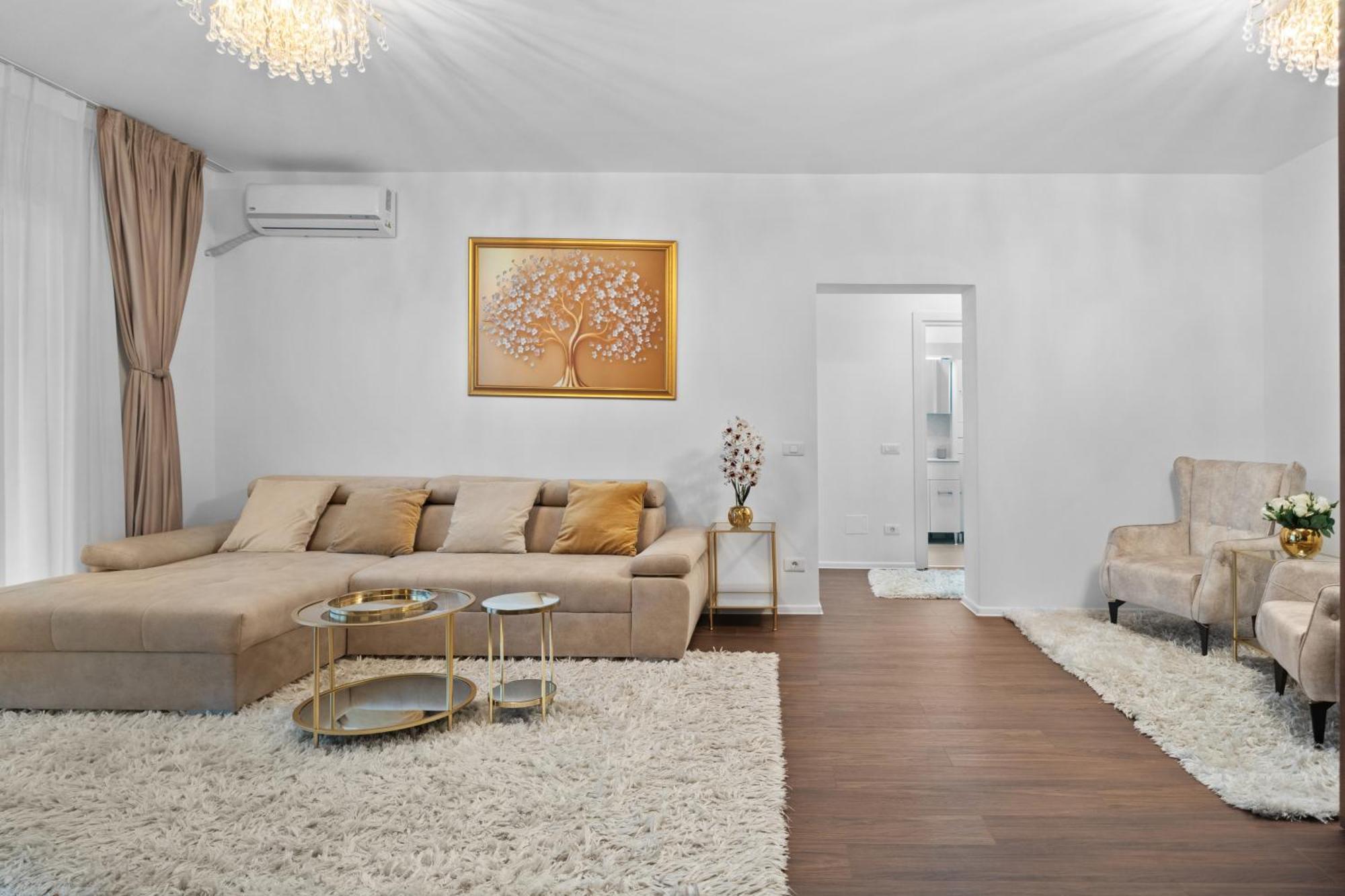 Stylish Gold Accents Apartment Bucharest